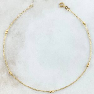 Tobillera Aro Seguido 1.5gr / 23cm-24.5cm / 1mm Bolas Lisas 2mm Oro Amarillo +4 18K Tobillera Aro Seguido 1.5gr / 23cm-24.5cm / 1mm Bolas Lisas 2mm Oro Amarillo +4 18K