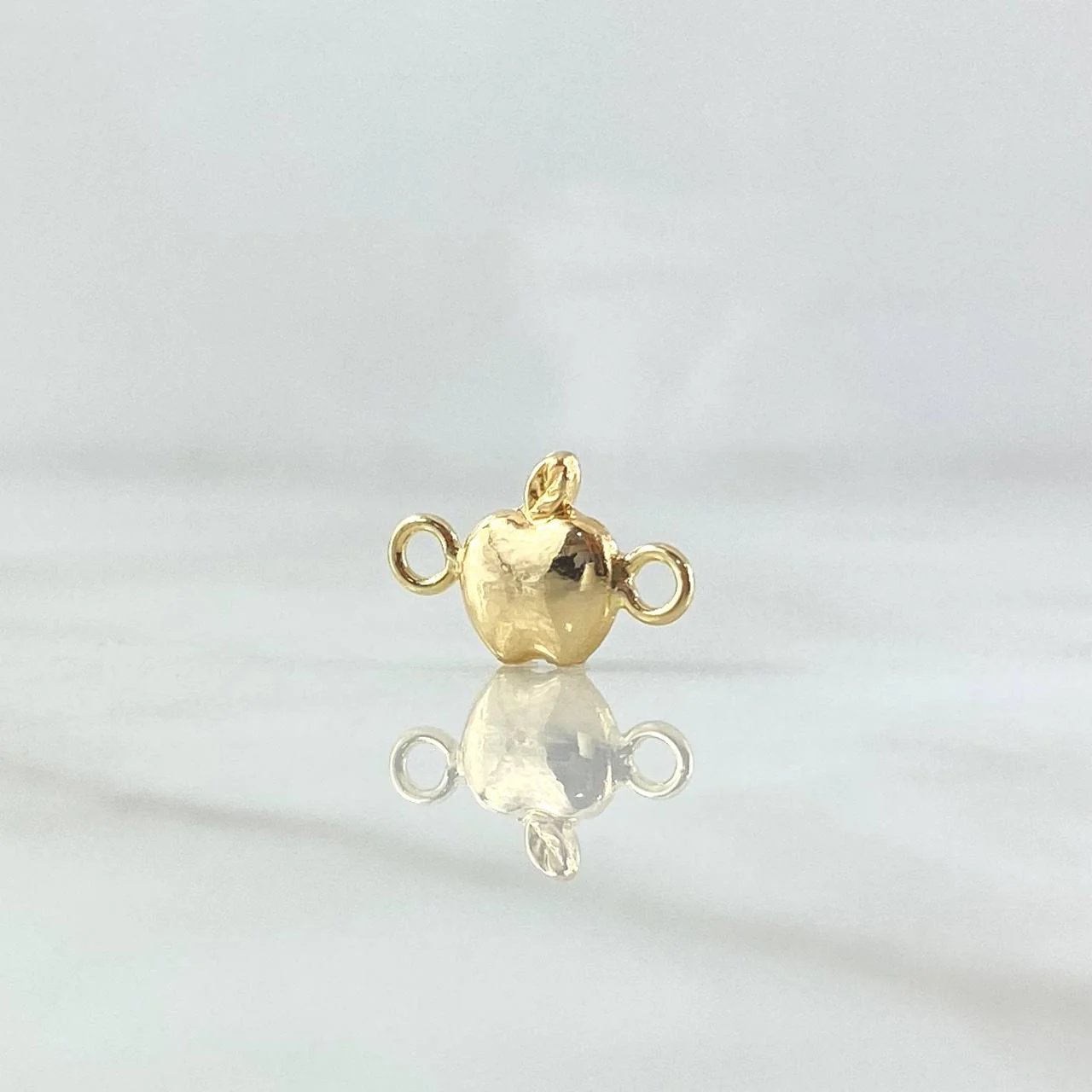 Herraje Manzana 0.3gr / 1.3cm / Oro 18K