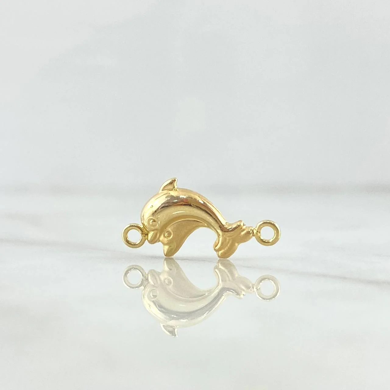Herraje Delfines 0.5gr / 2cm / Mate – Liso Oro Amarillo 18K