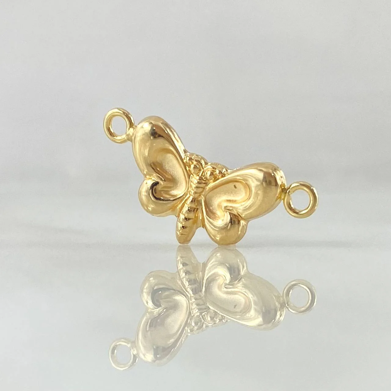Herraje Mariposa 0.75gr / 2.2cm / Oro 18K
